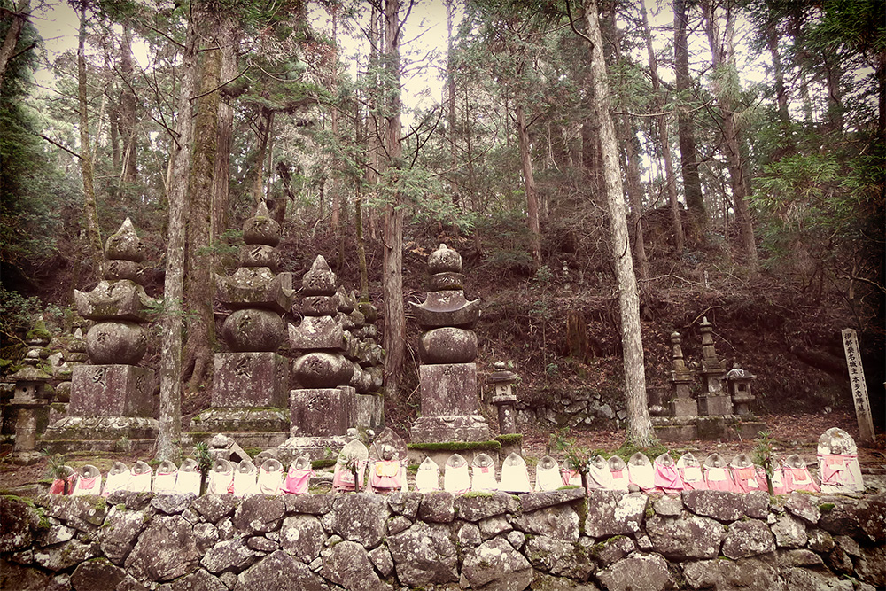 line of stone markers and small statues