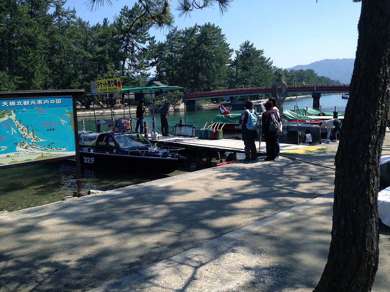 japanese ferry boats at a dock blue water