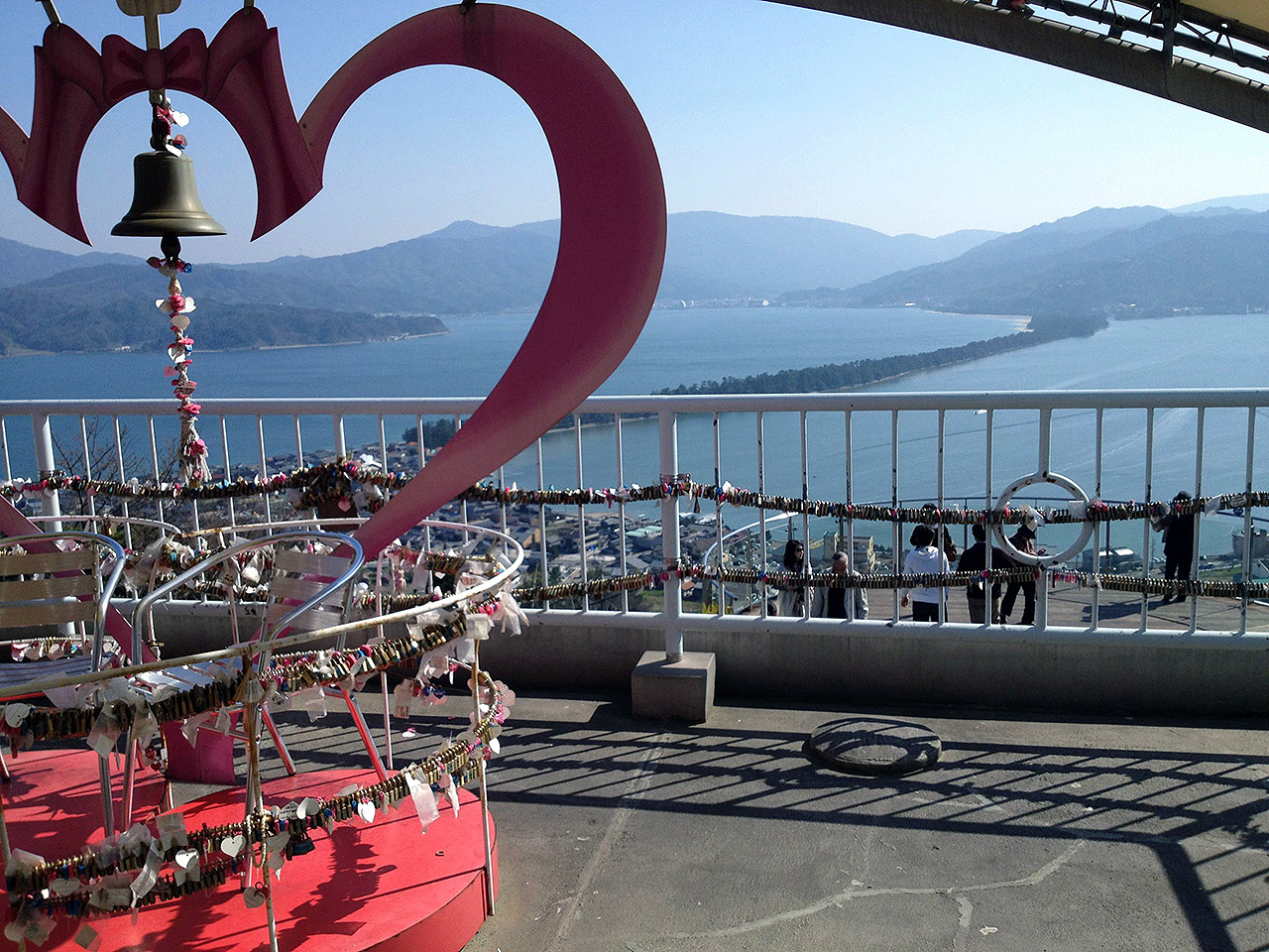 a pink love seat japan overlooking ocean