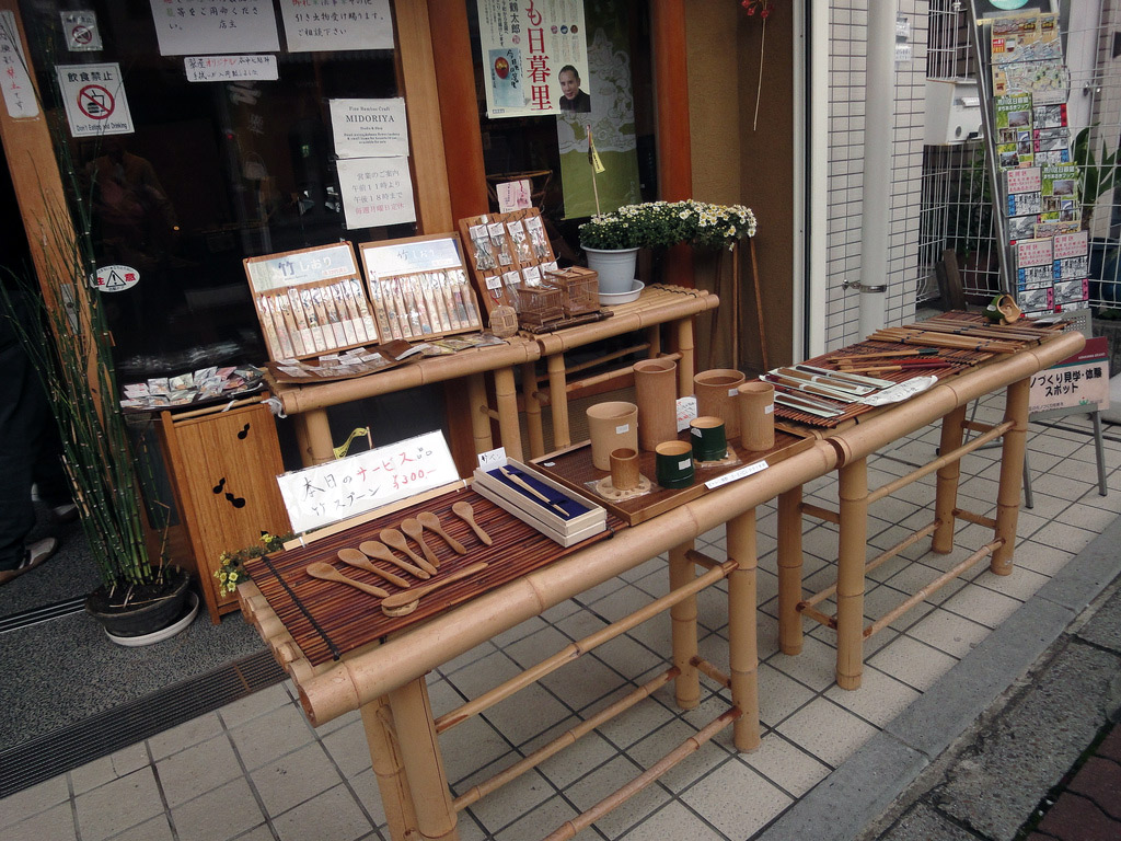 bamboo utensils displayed in front of shop