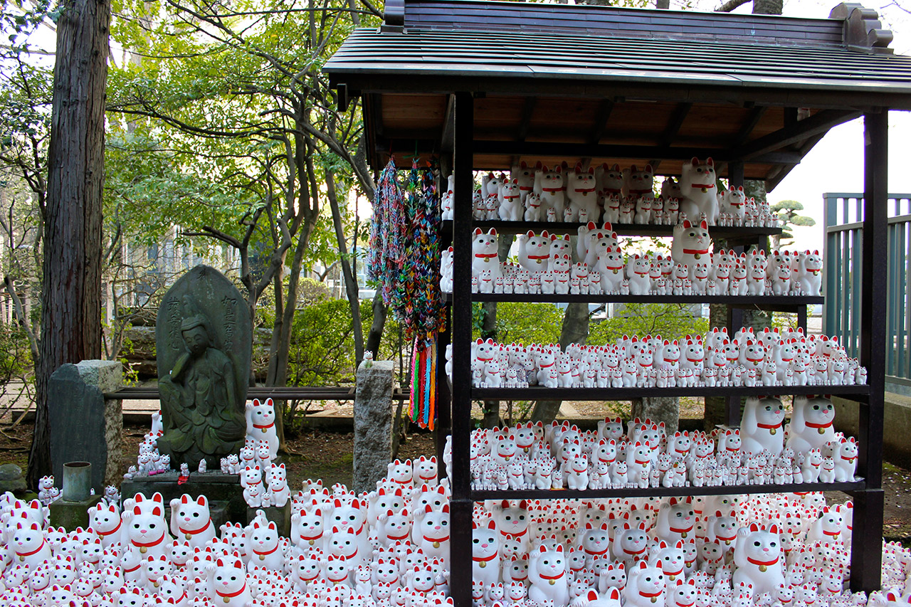 shrine with many cats