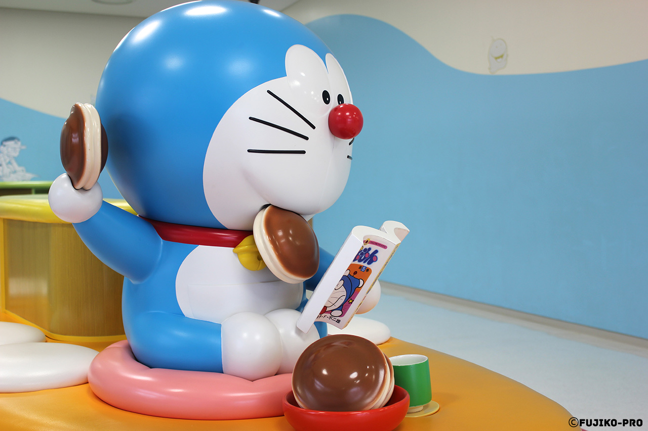 blue space cat doraemon statue