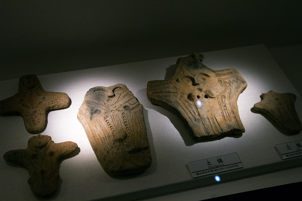 clay figures on display in museum