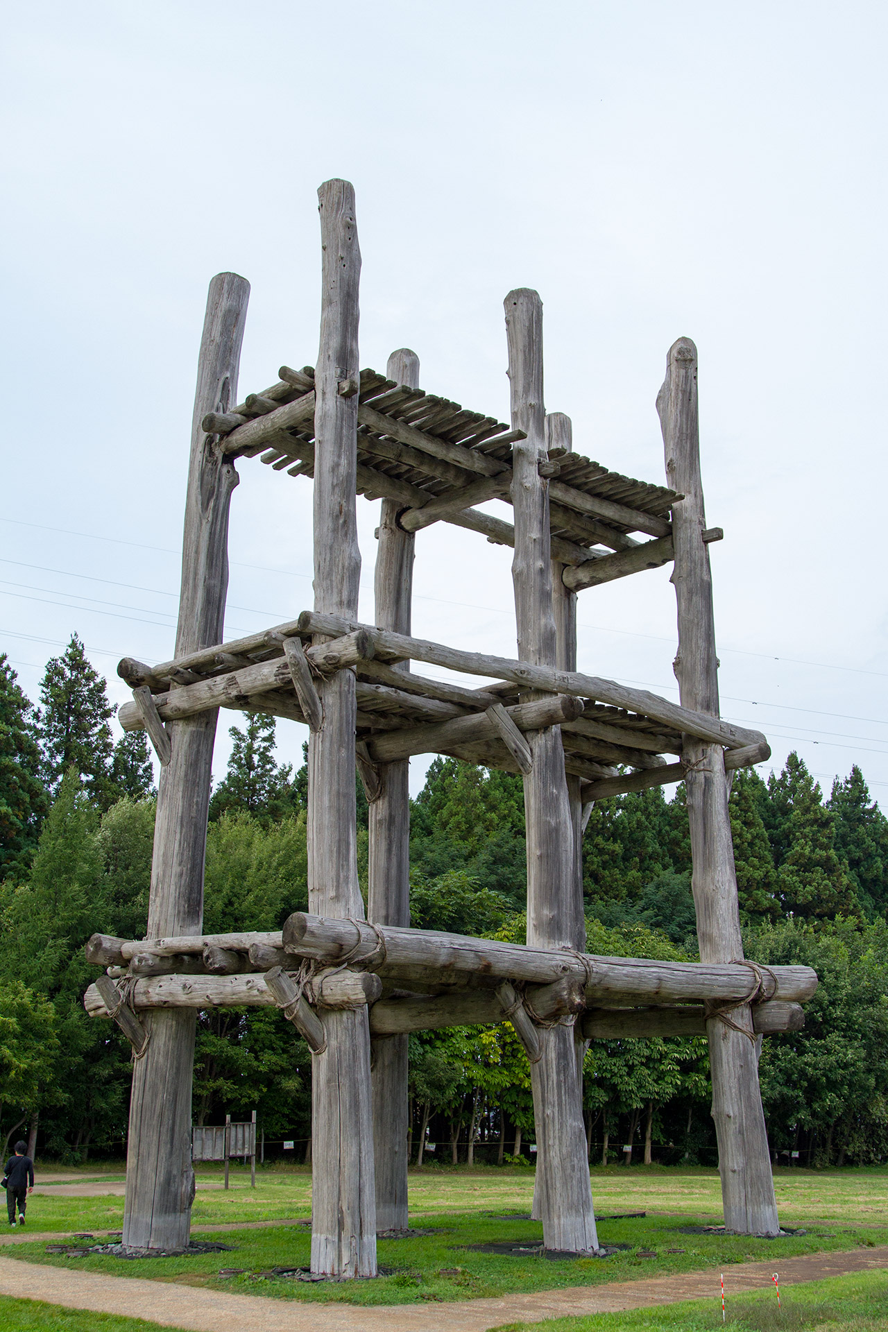 three levelled wooden structure with platforms