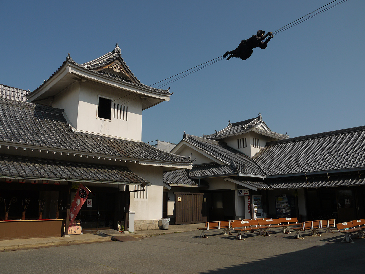 ninja traveling on high wire