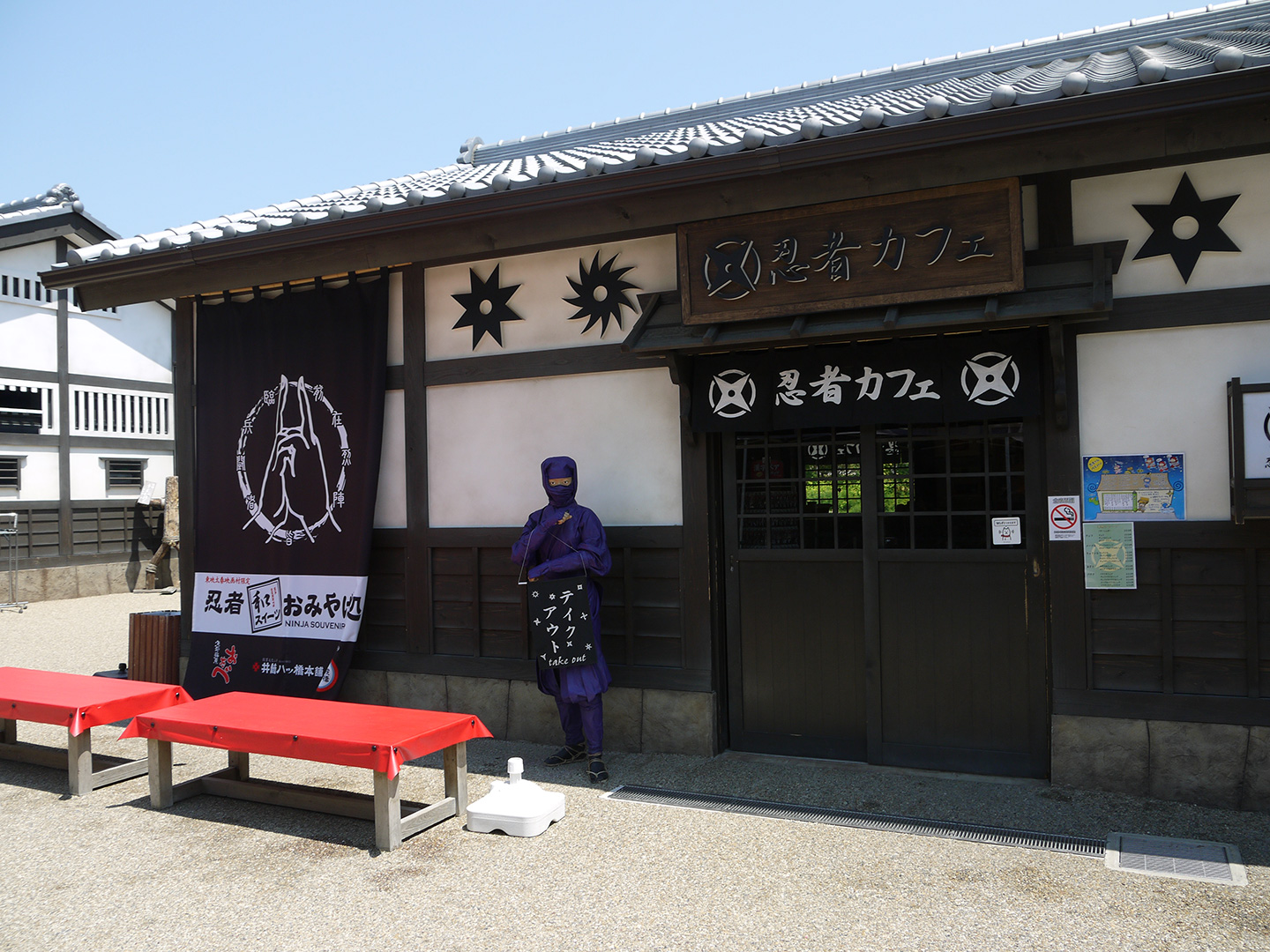 ninja themed restaurant with manikin out front