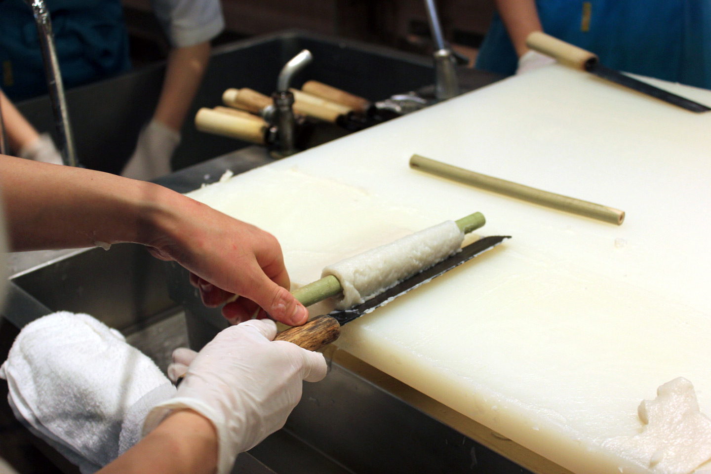 chikuwa being rolled and trimmed