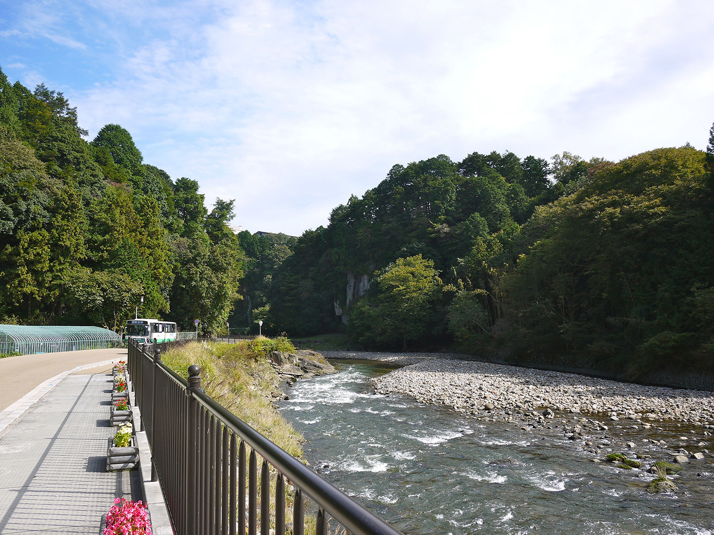 road alongside river in japan