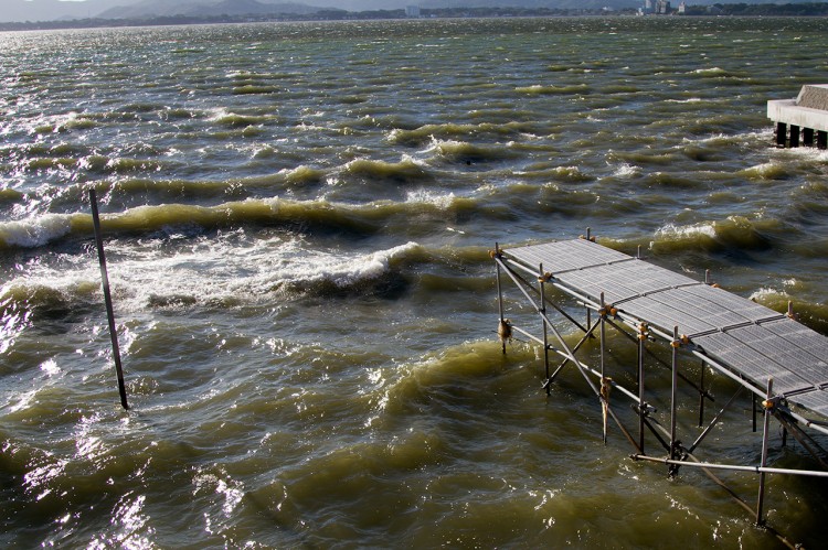 waves pier white caps