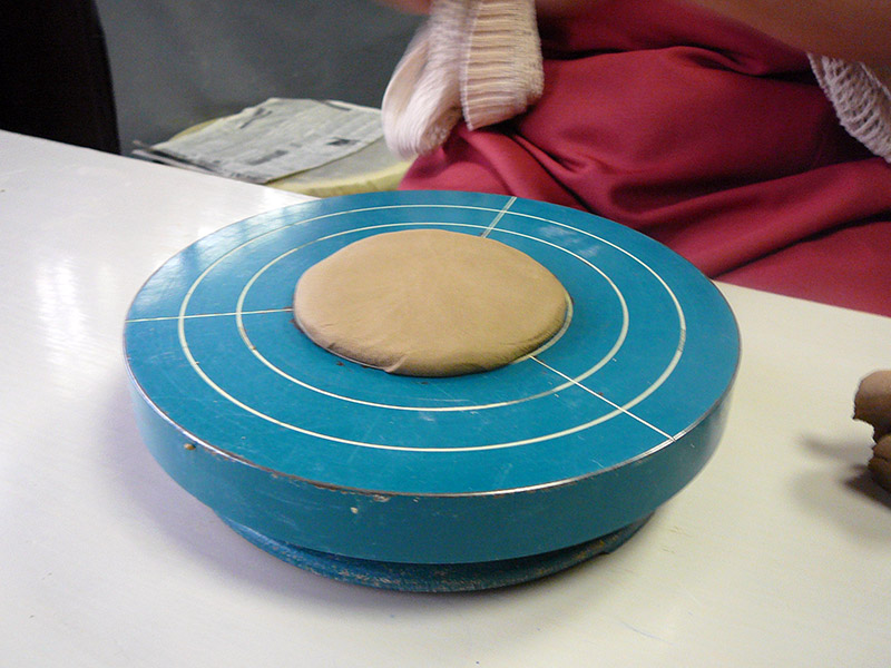 pottery wheel in use