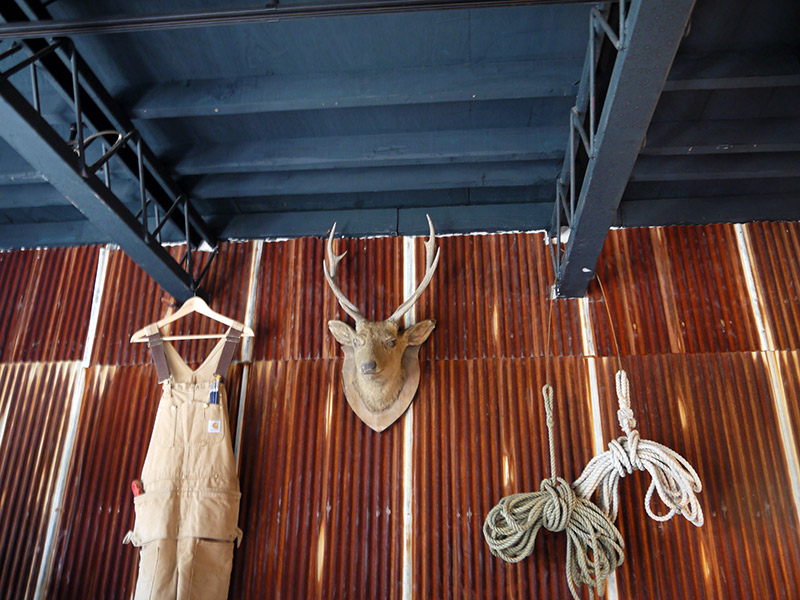 deer overalls and rope hanging on walls rustic japan