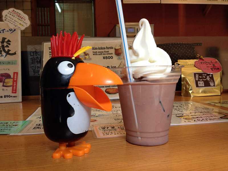 toy penguin and beverage