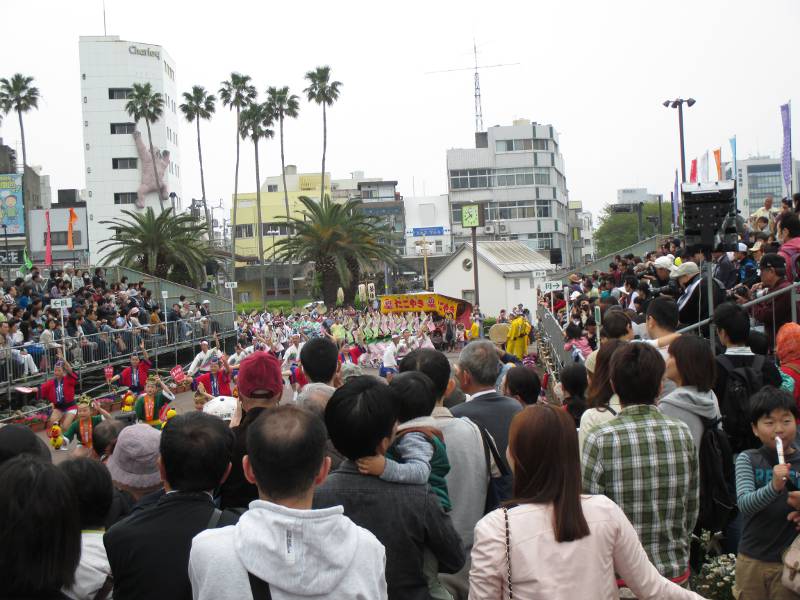 large crowd of people watching traditional dance japan
