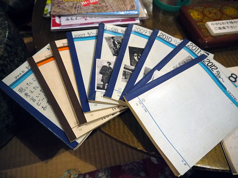 A pile of Japanese notebooks