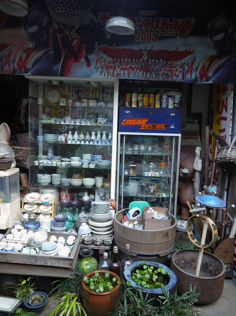 Several trinkets and an Ultraman tarp at the museum