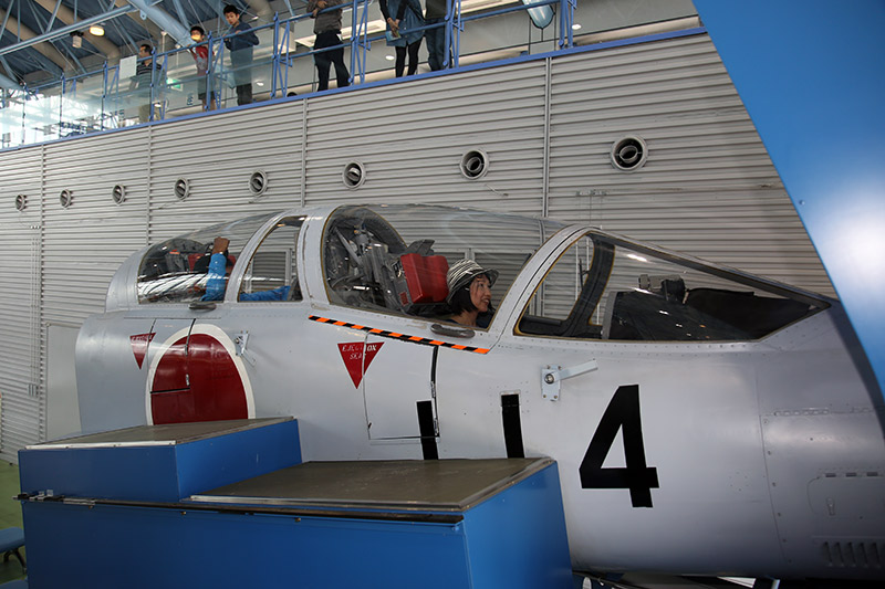 Mami inside the simulator at the JASDF Air Park