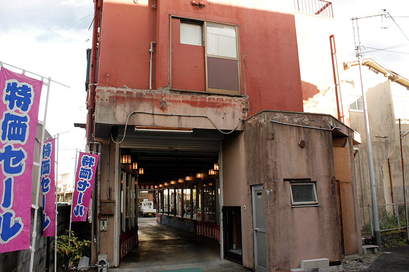 Looking back on the building, having come out the other end of the hallway