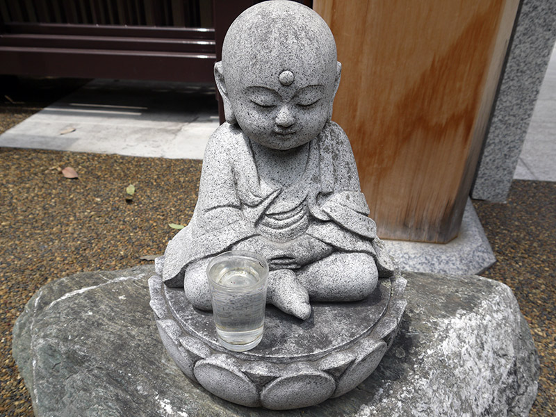 happy baby jizo statues japanese stone statue