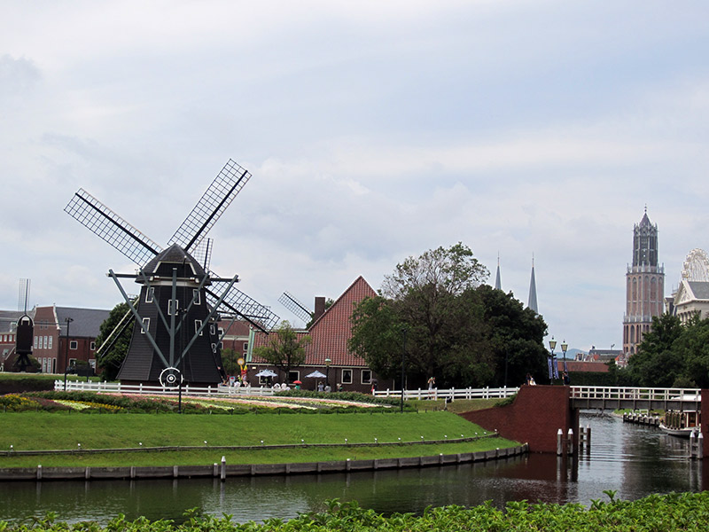 cloudy day landscape with windmills