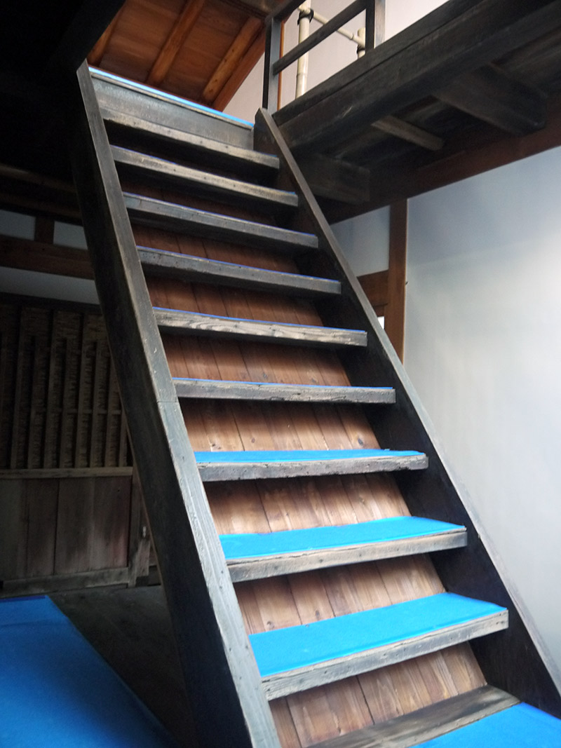 wooden staircase going up to second floor