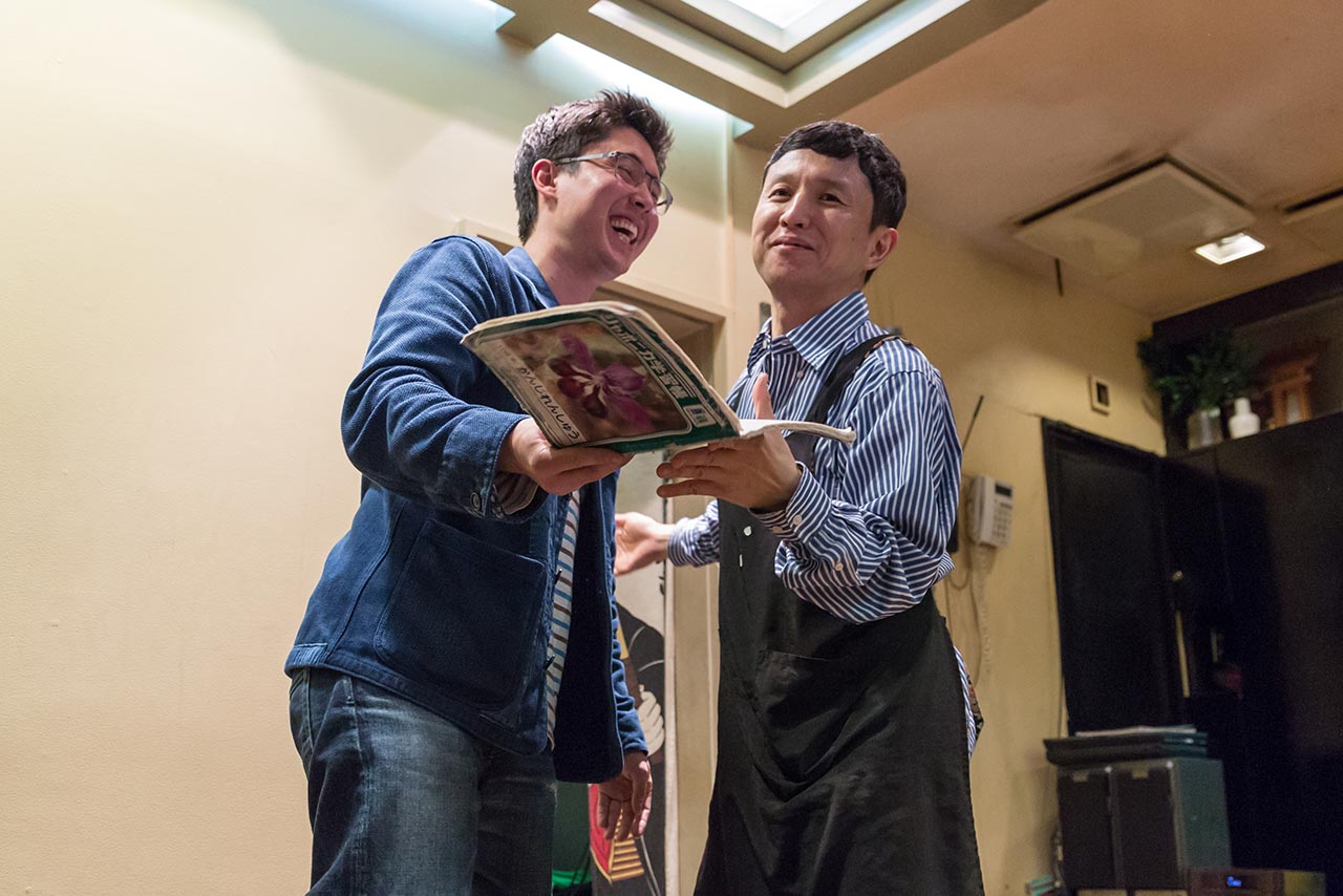 Mark Kagaya and Koichi singing the table's order