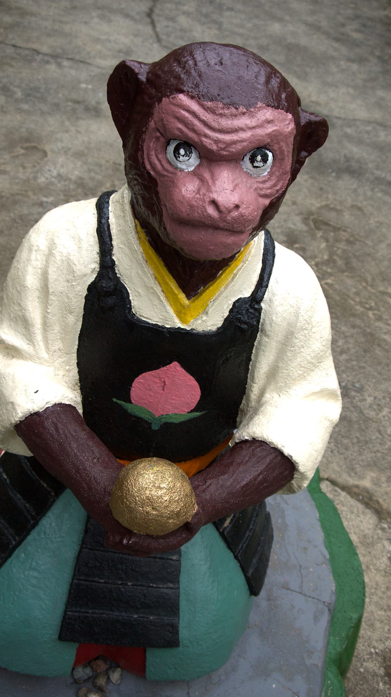 monkey statue at momotaro shrine