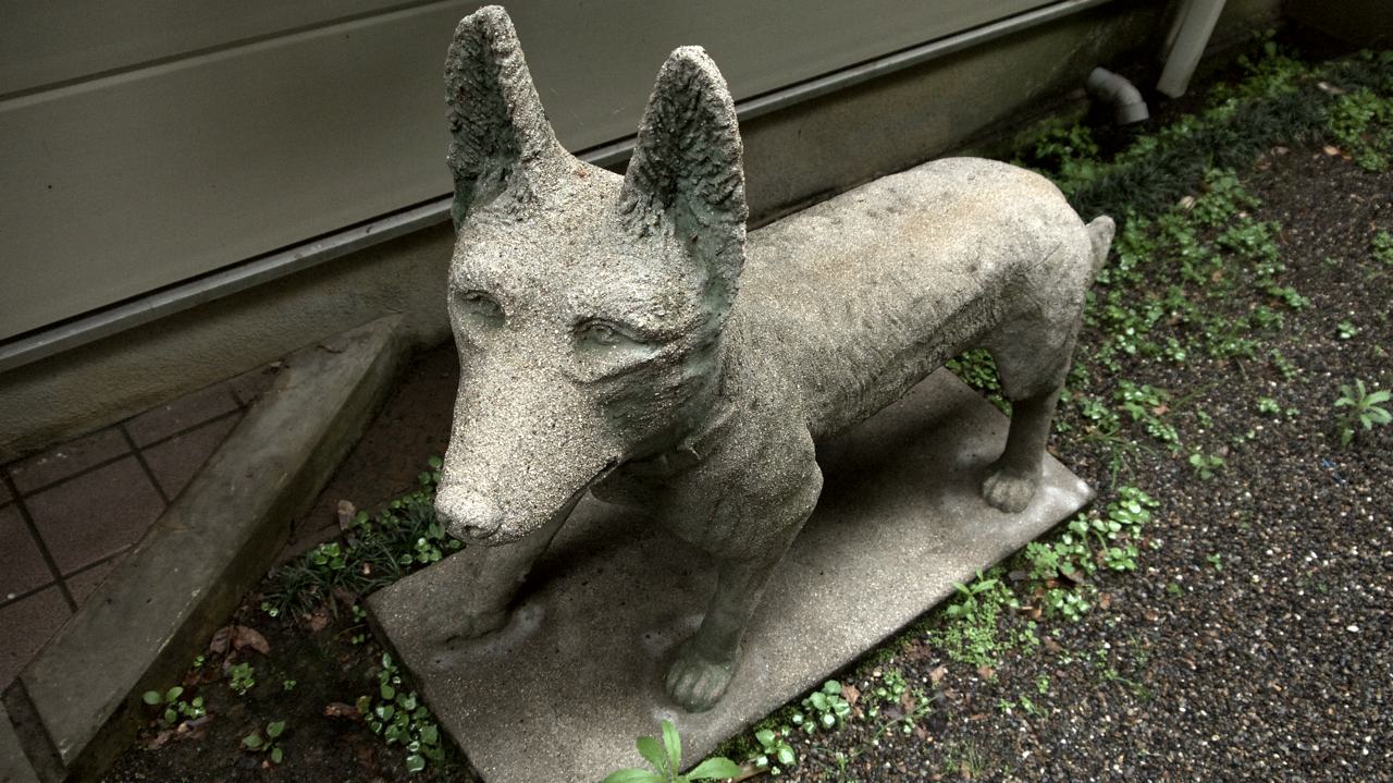 a stone dog statue