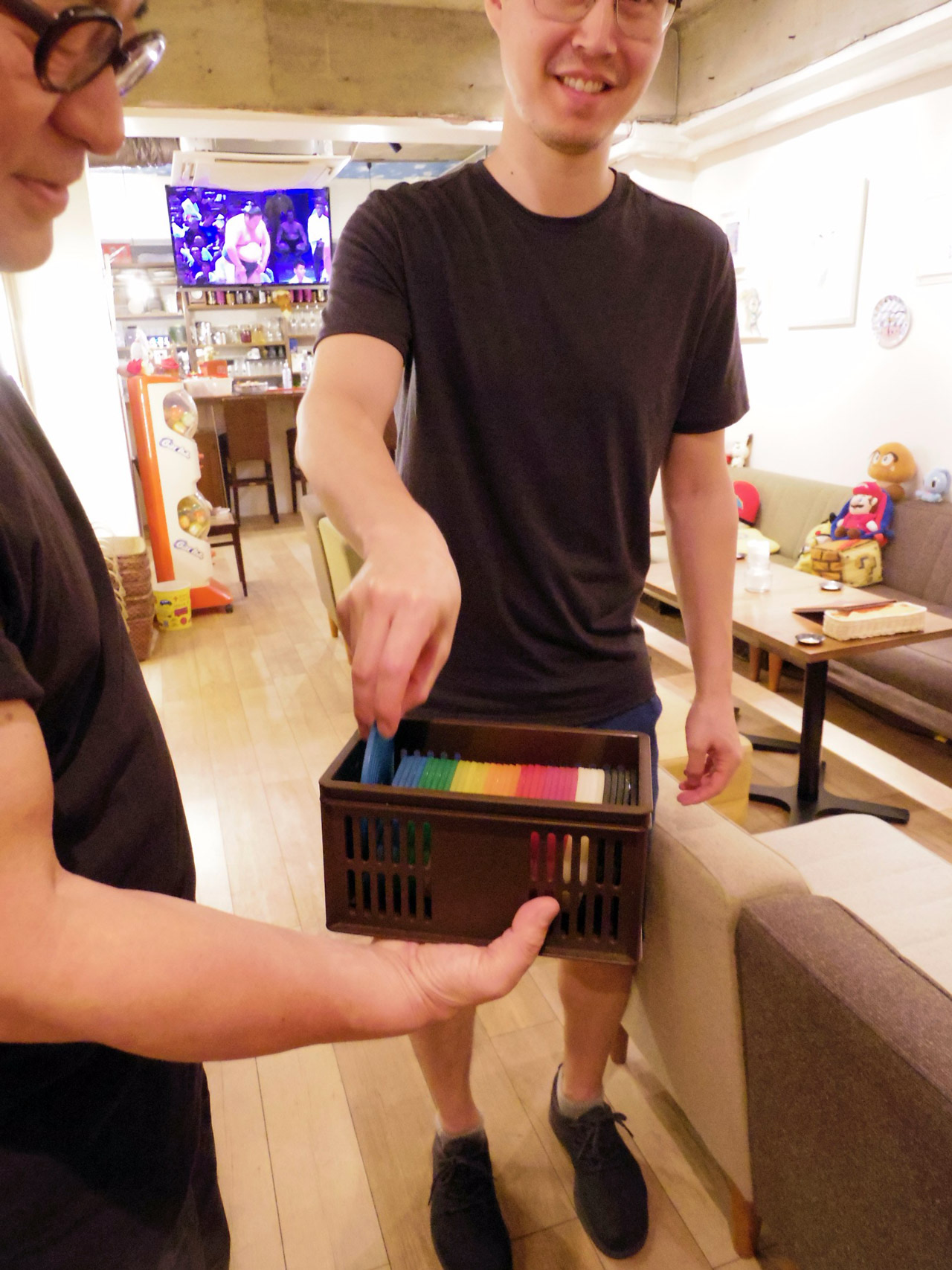 koichi choosing colored coaster