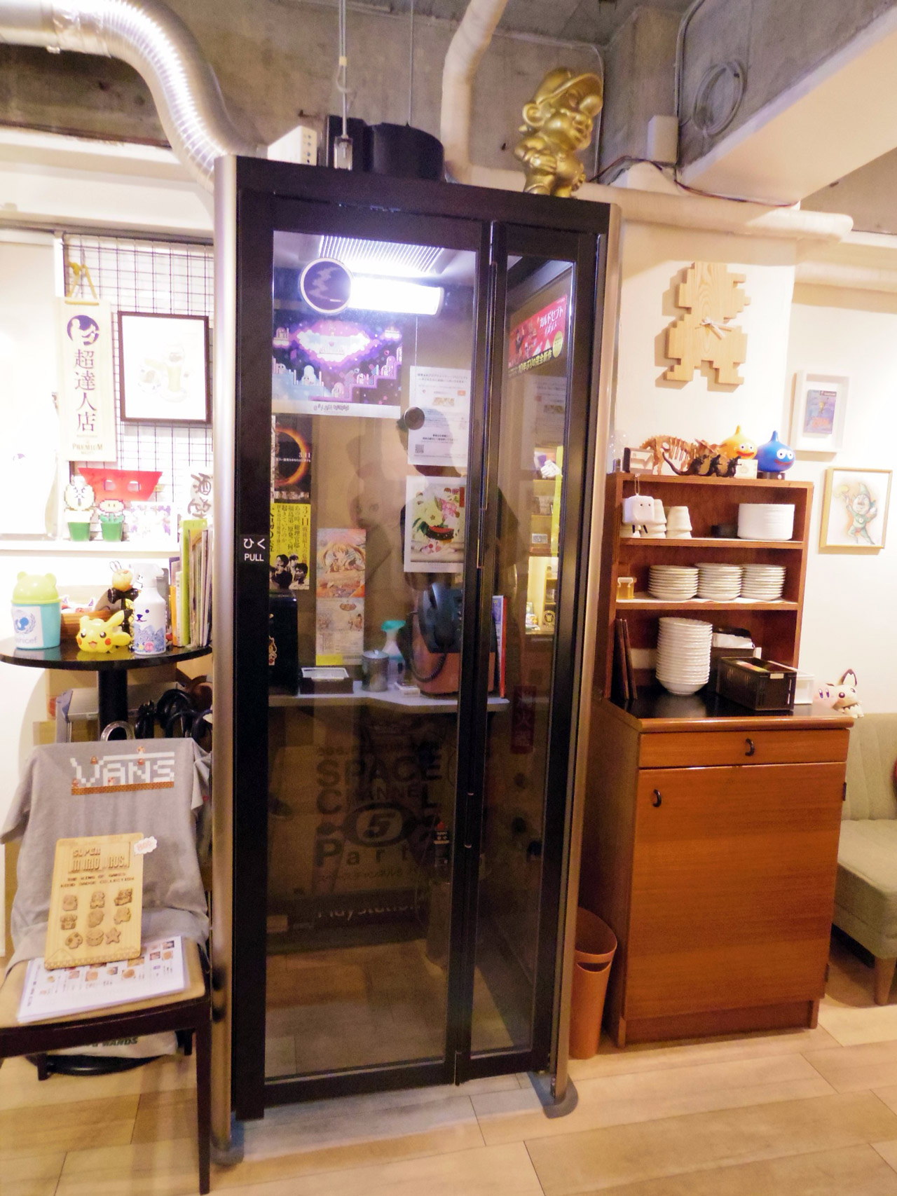 telephone booth inside secret video game cafe