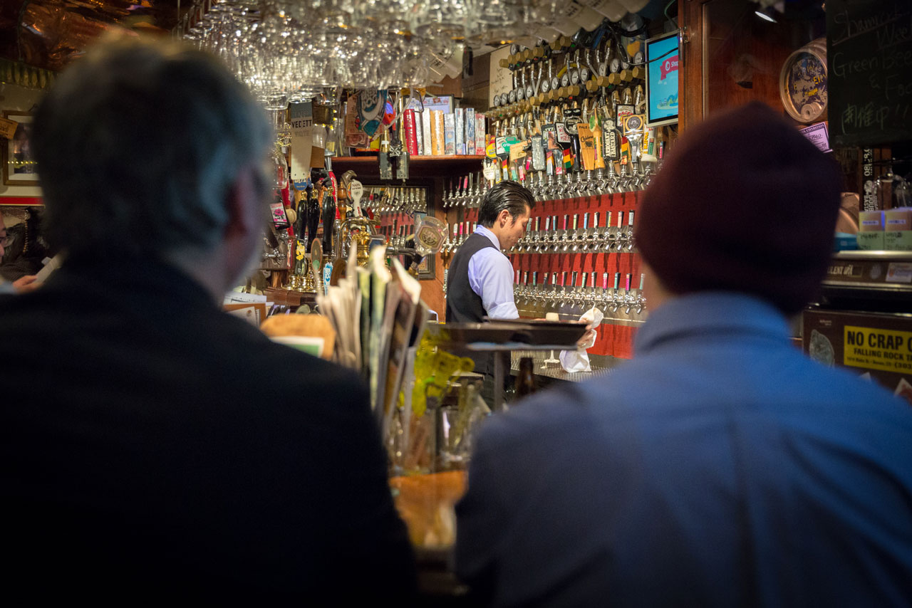 bartender serving japanese craft beer in tokyo