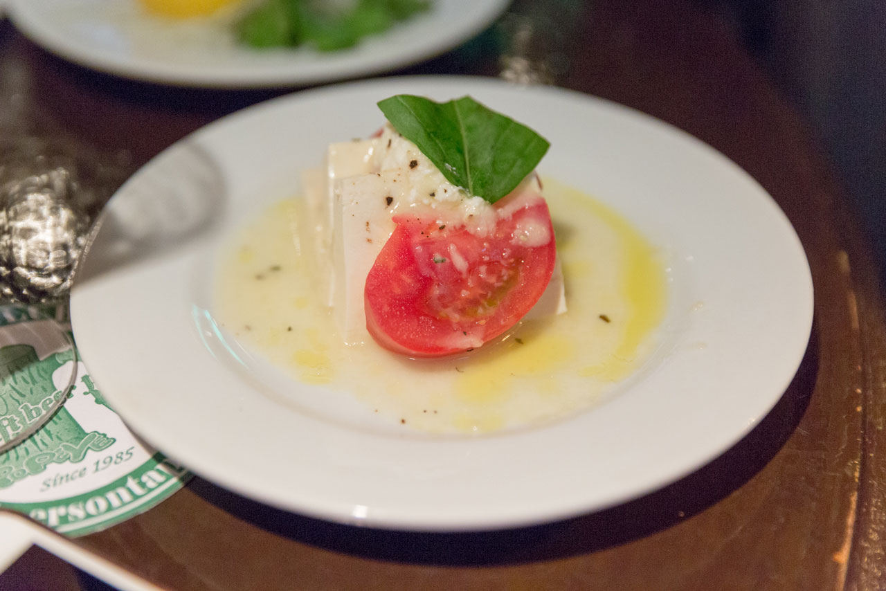 caprese salad served with japanese craft beer