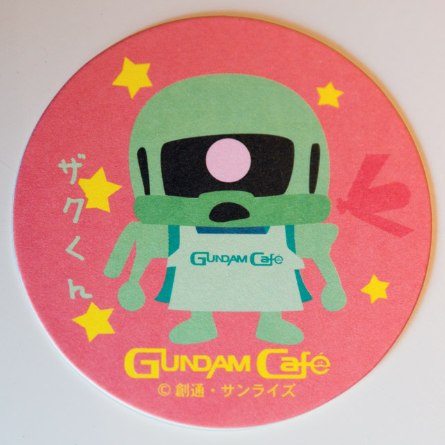 drink coaster featuring chibi zaku