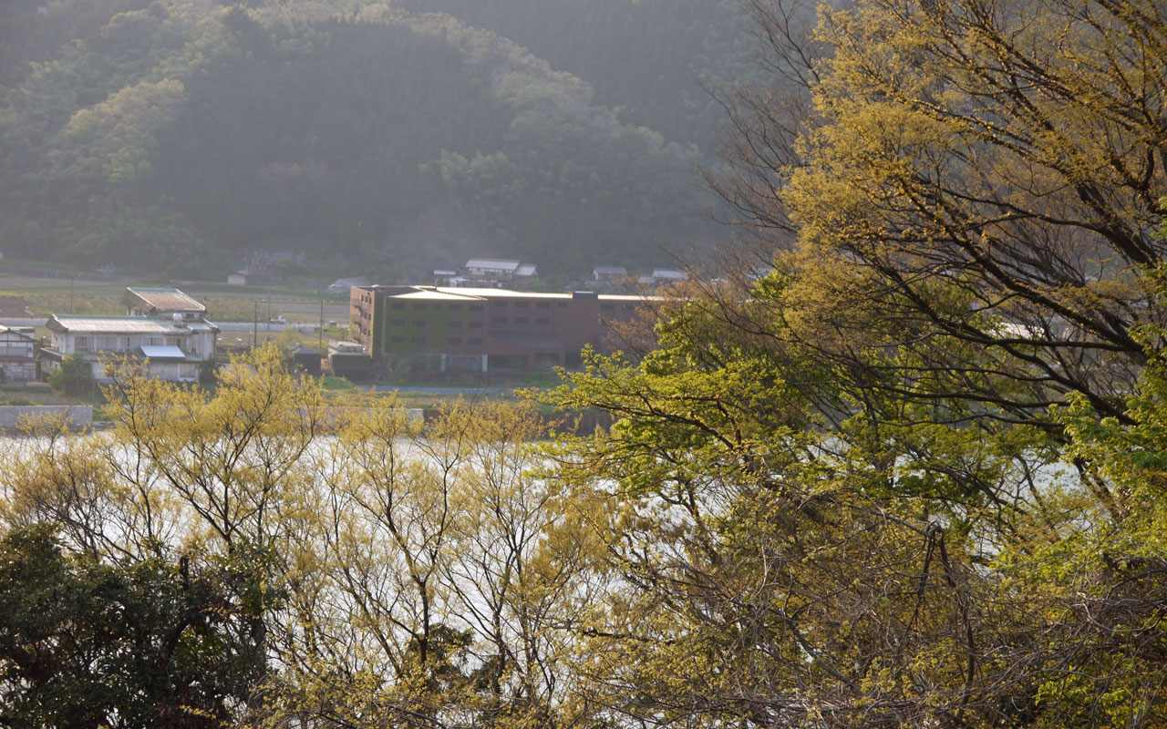 brown abandoned building near genbudo basalt cave japan