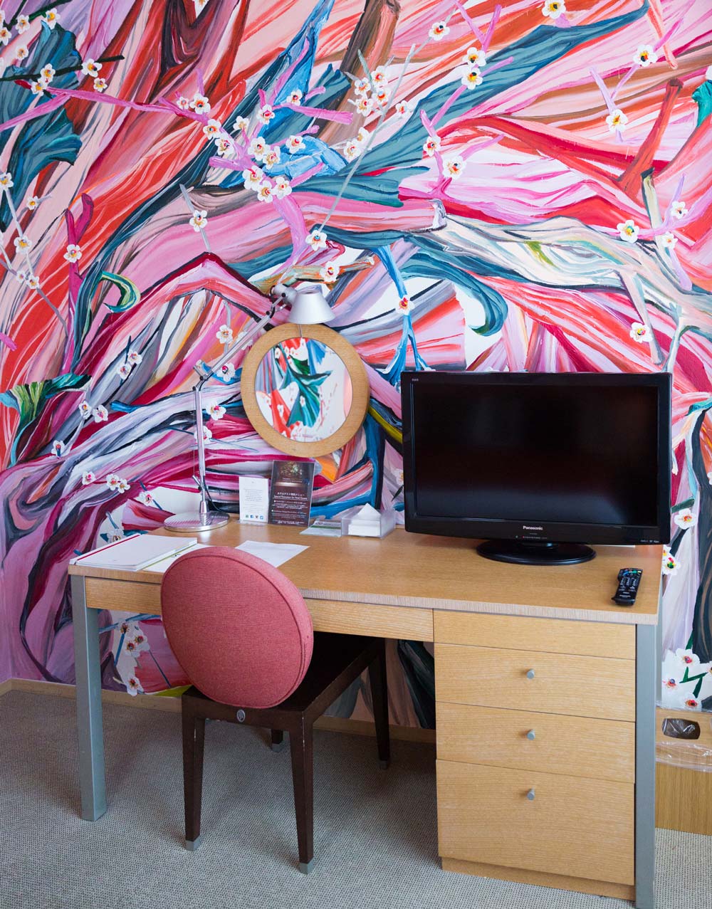 beautiful flower mural behind a desk