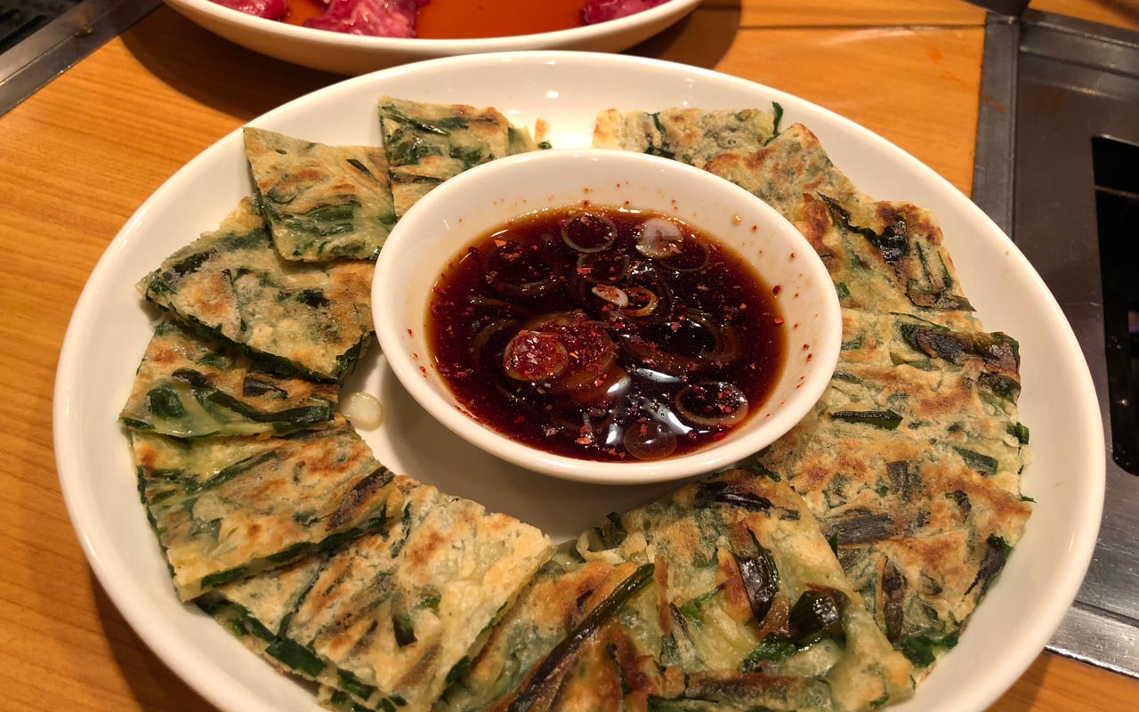 plate of korean chijimi pancake with sauce