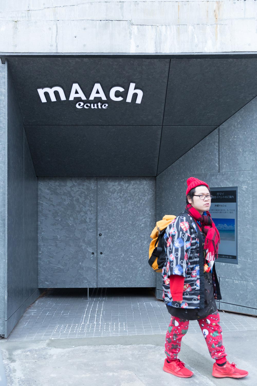 homeless kotani in front of maach ecute