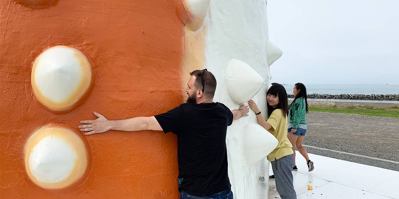 standing around the statue